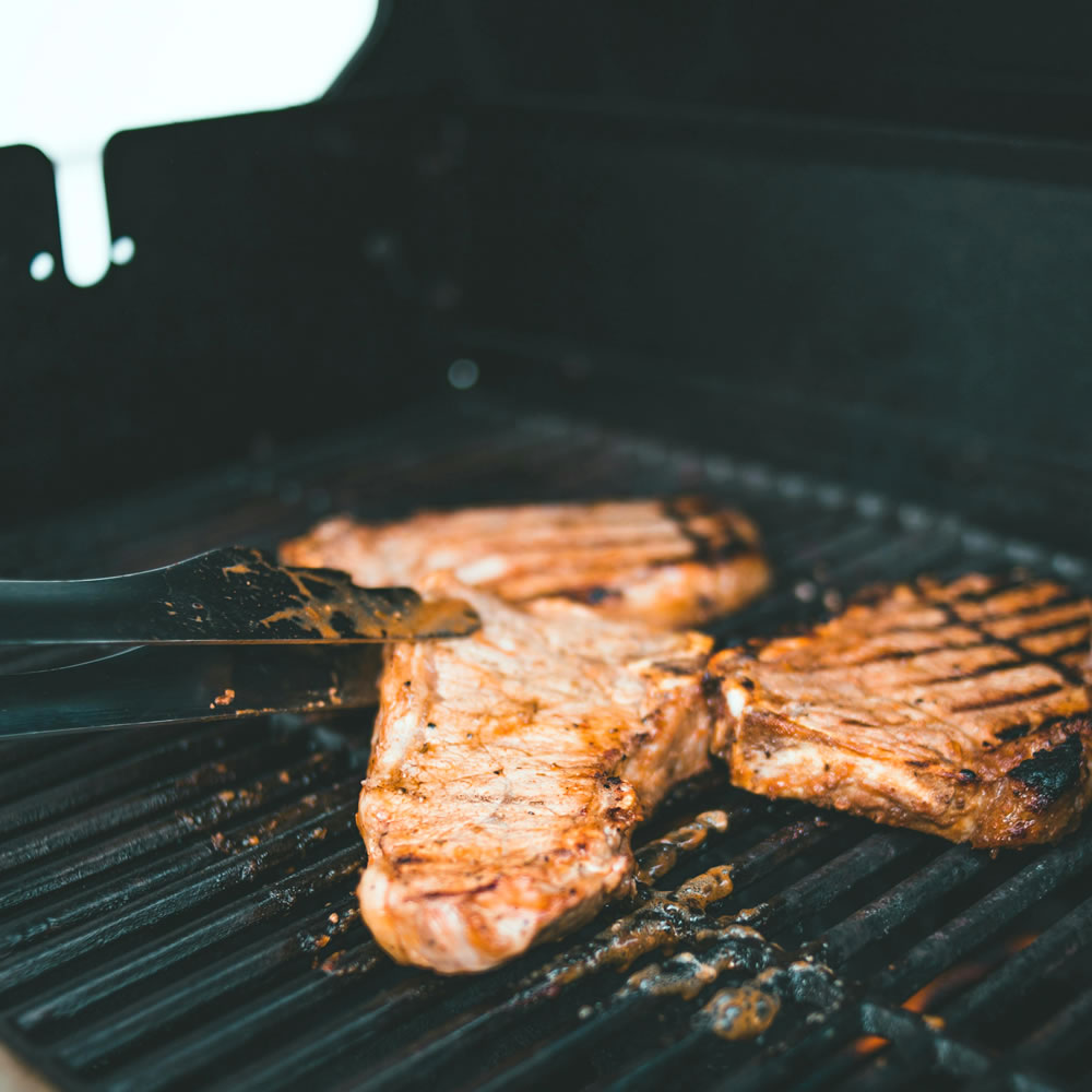 steak on gas grill